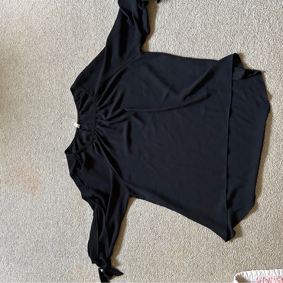 Black 3/4 blouse with ties around the wrist and partially open arms. Super cute! - Picture 2 of 3